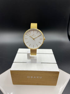 Montre Obaku avec cadran blanc et bracelet doré - Bijouterie Jean-Claude Gagnon